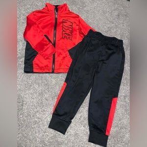 Nike 18 month red and black zip up jacket with pants set outfit. Like new!